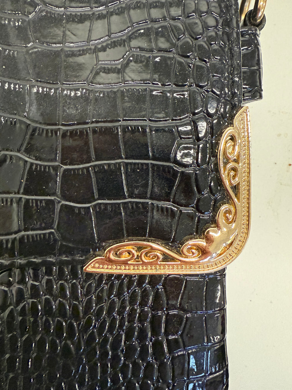 Black and gold snakeskin chain bag