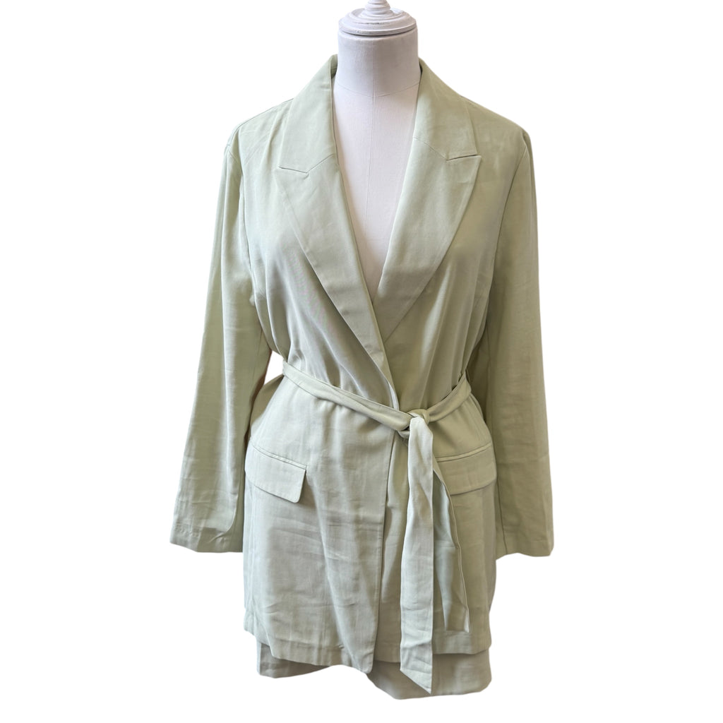 Pale green short suit with longline belted blazer