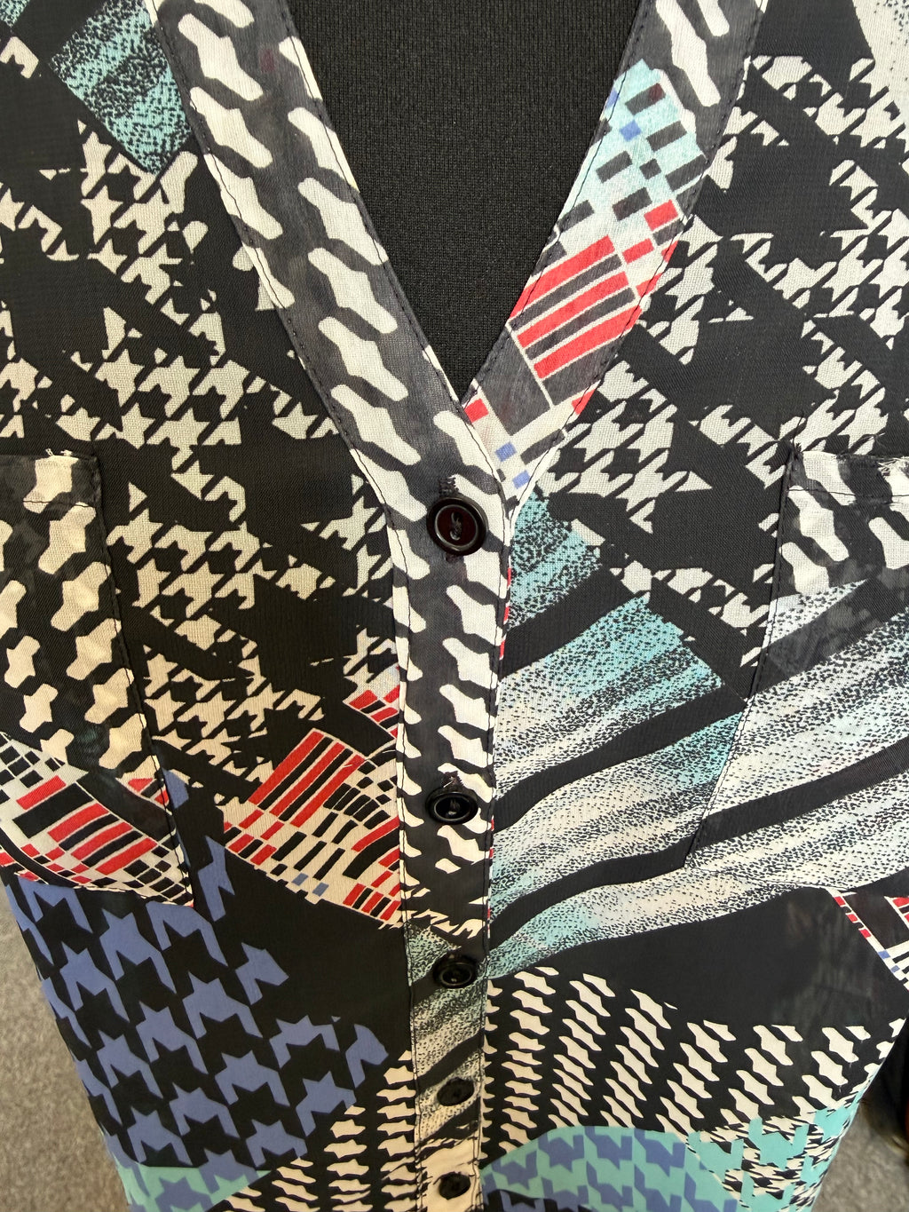 George multi pattern sleeveless collared blouse
