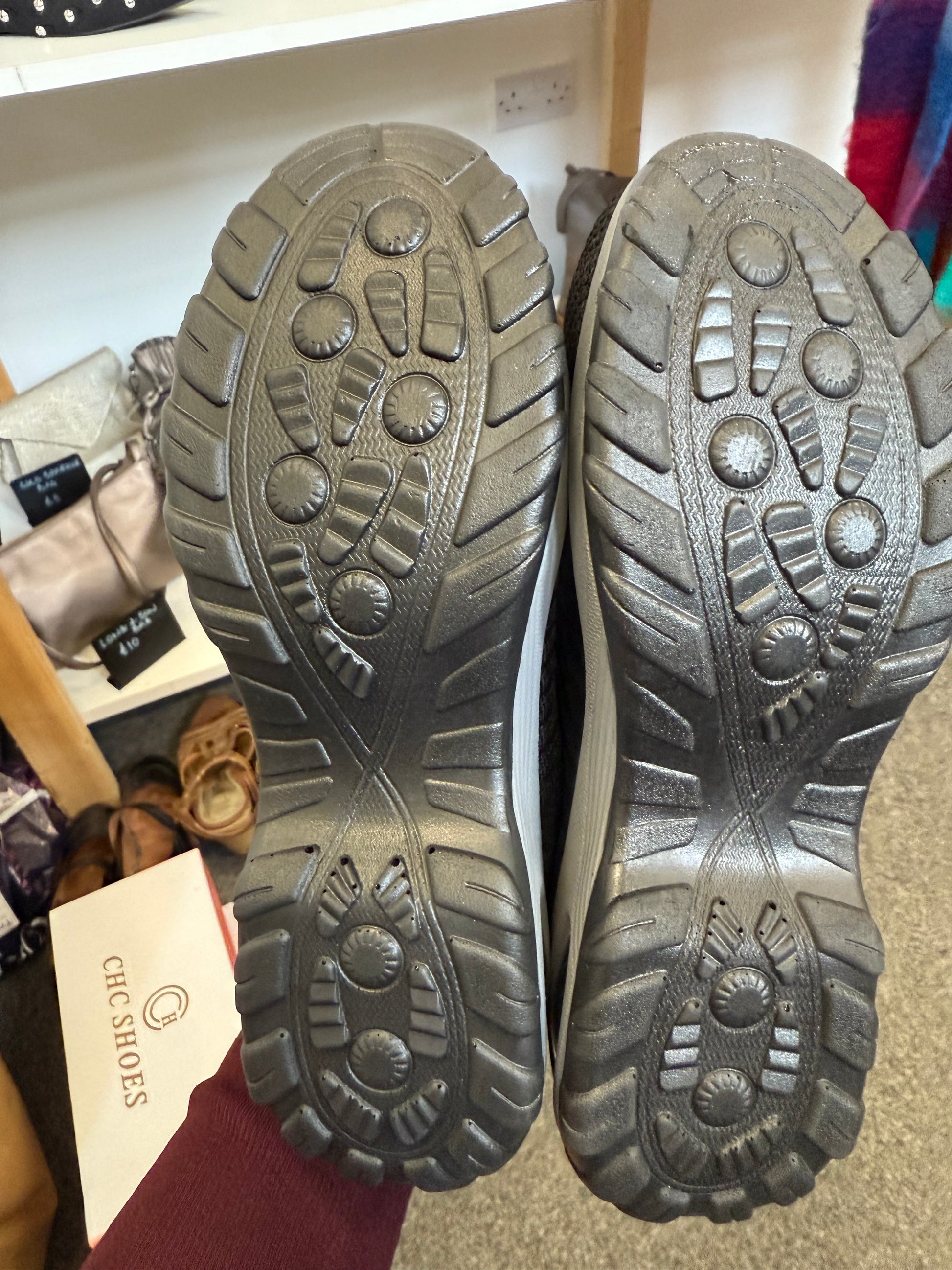 Black soft slip on trainers