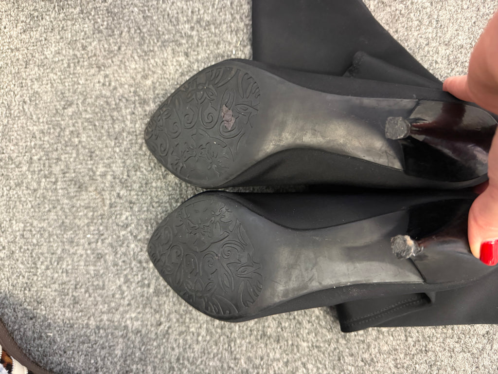 Black long heeled pull on boots