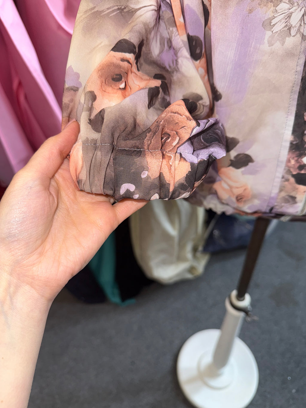 Floral frill neck zip fastening long sleeved top