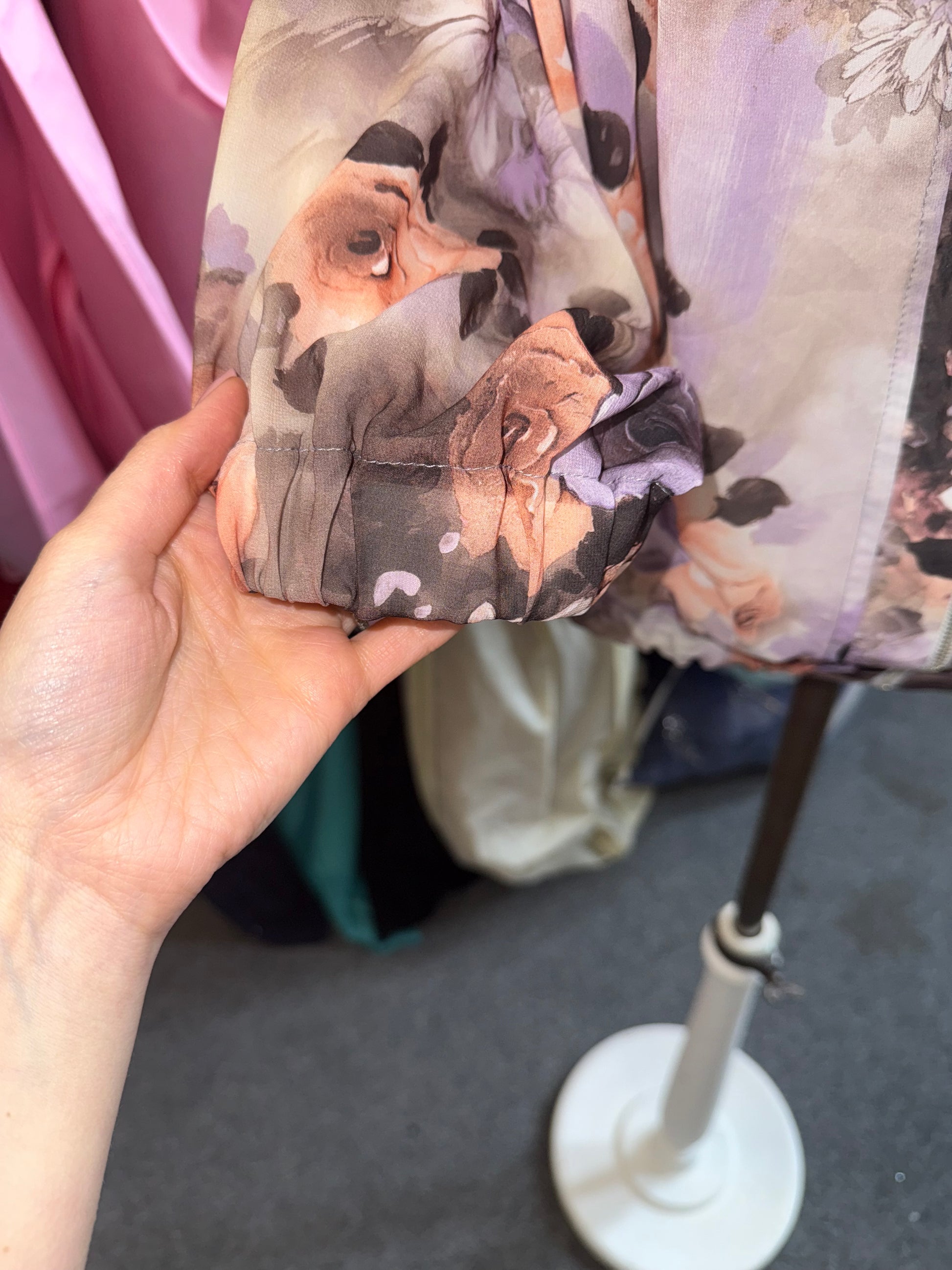 Floral frill neck zip fastening long sleeved top