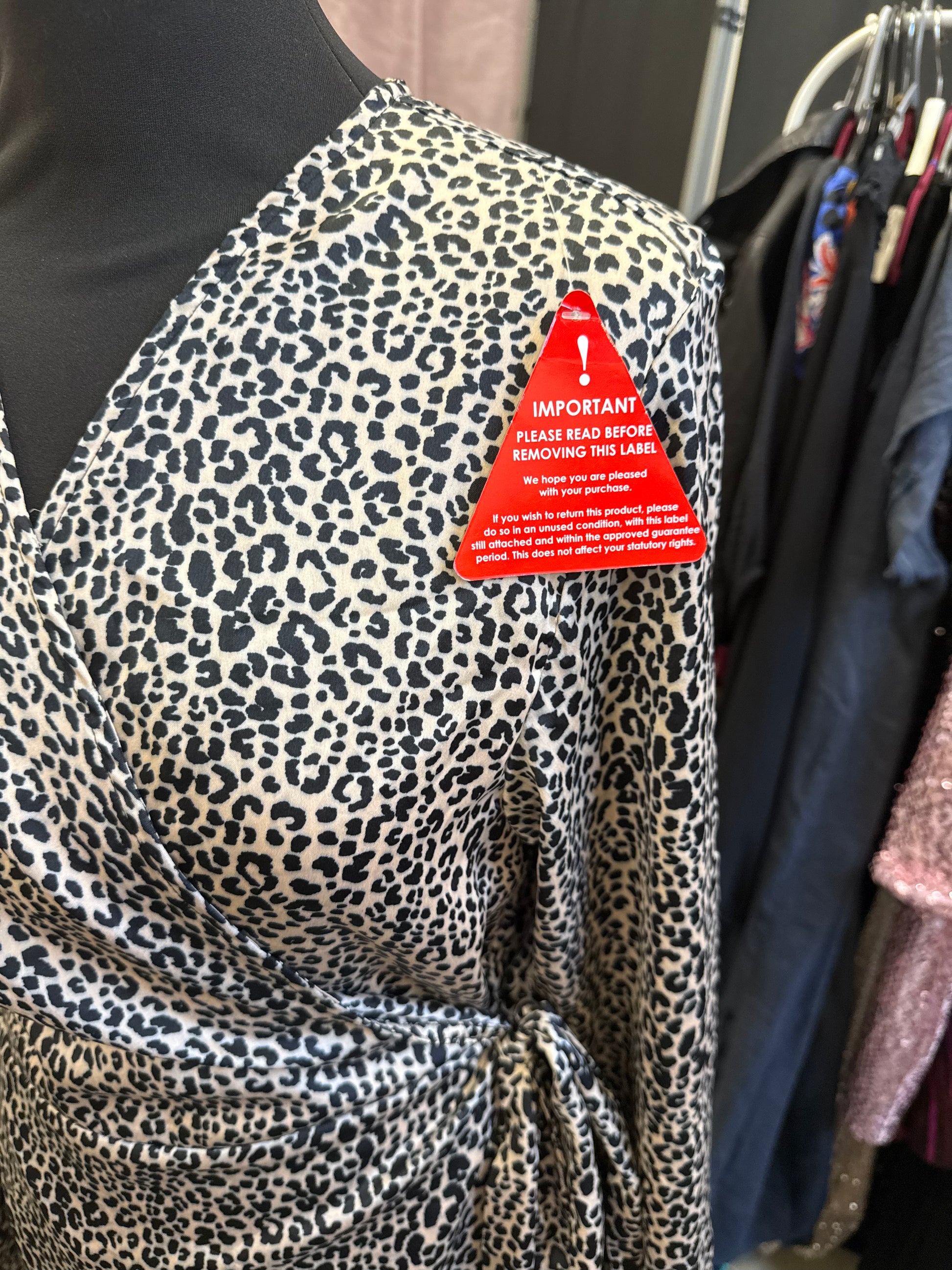 Dancing Leopard animal print long sleeved wrap dress