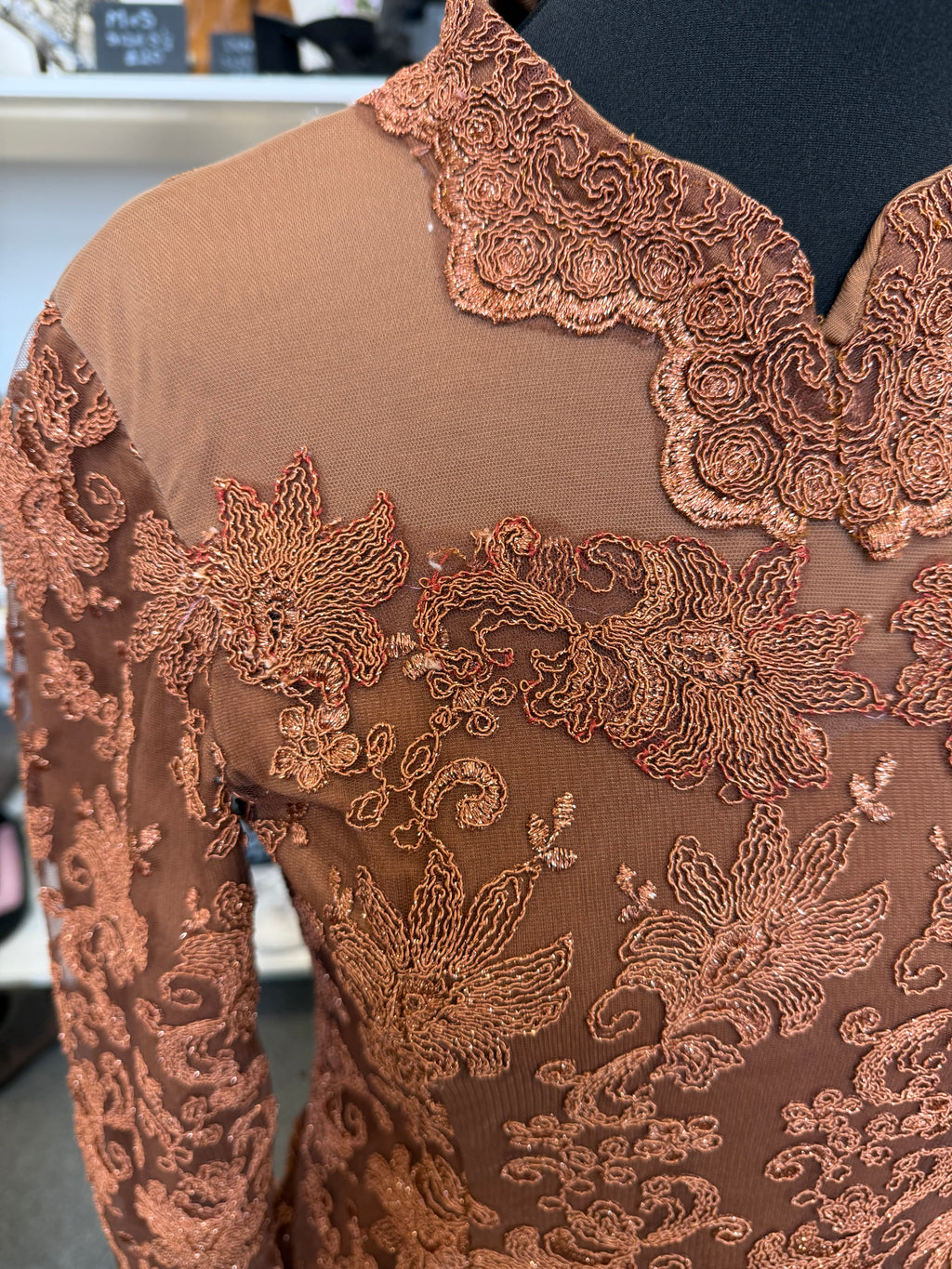 Bronze long sleeve button back embroidered long line top