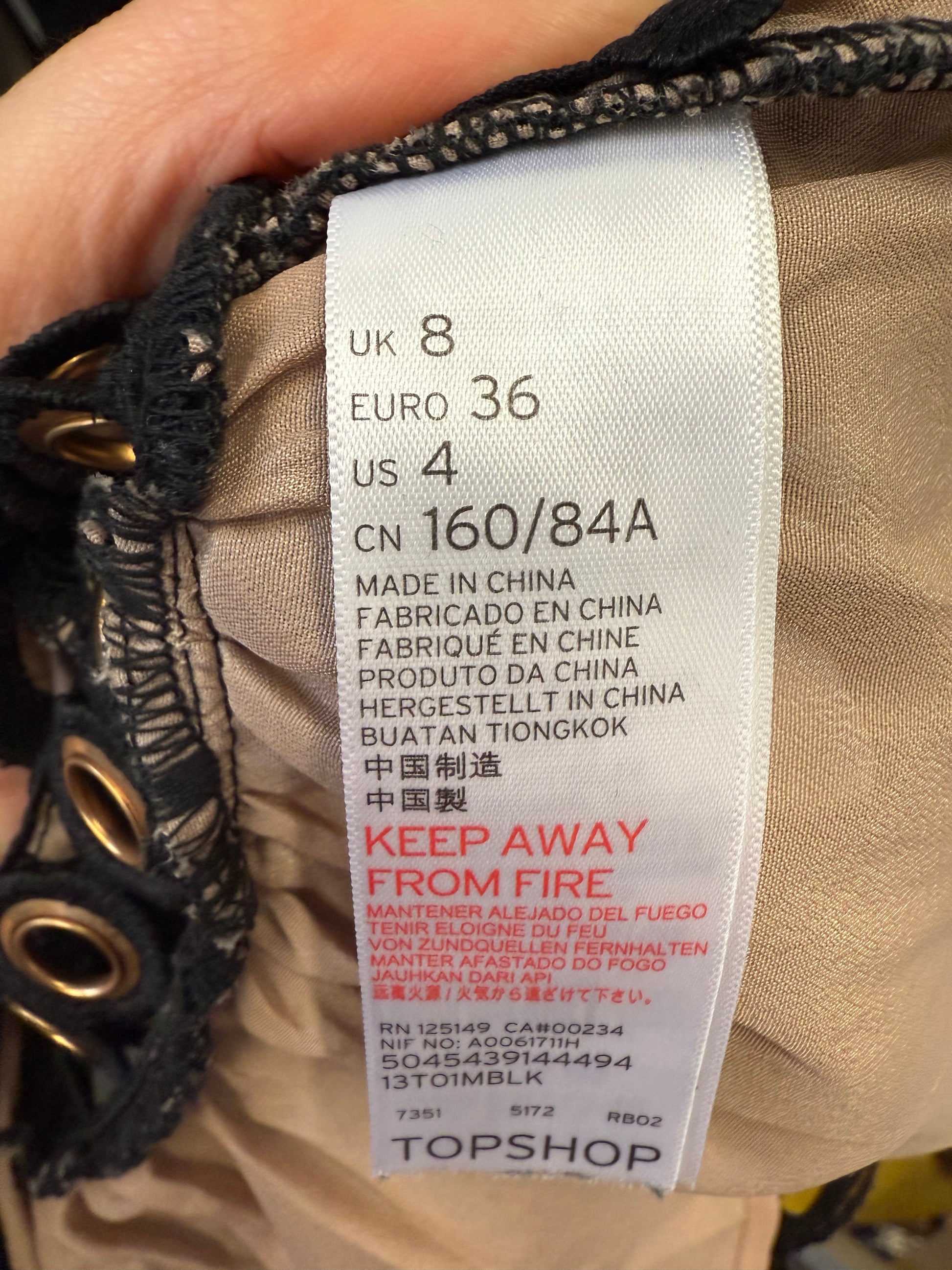 Topshop black crochet bronze hoop peplum top