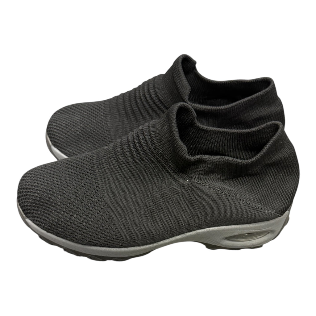 Black soft slip on trainers
