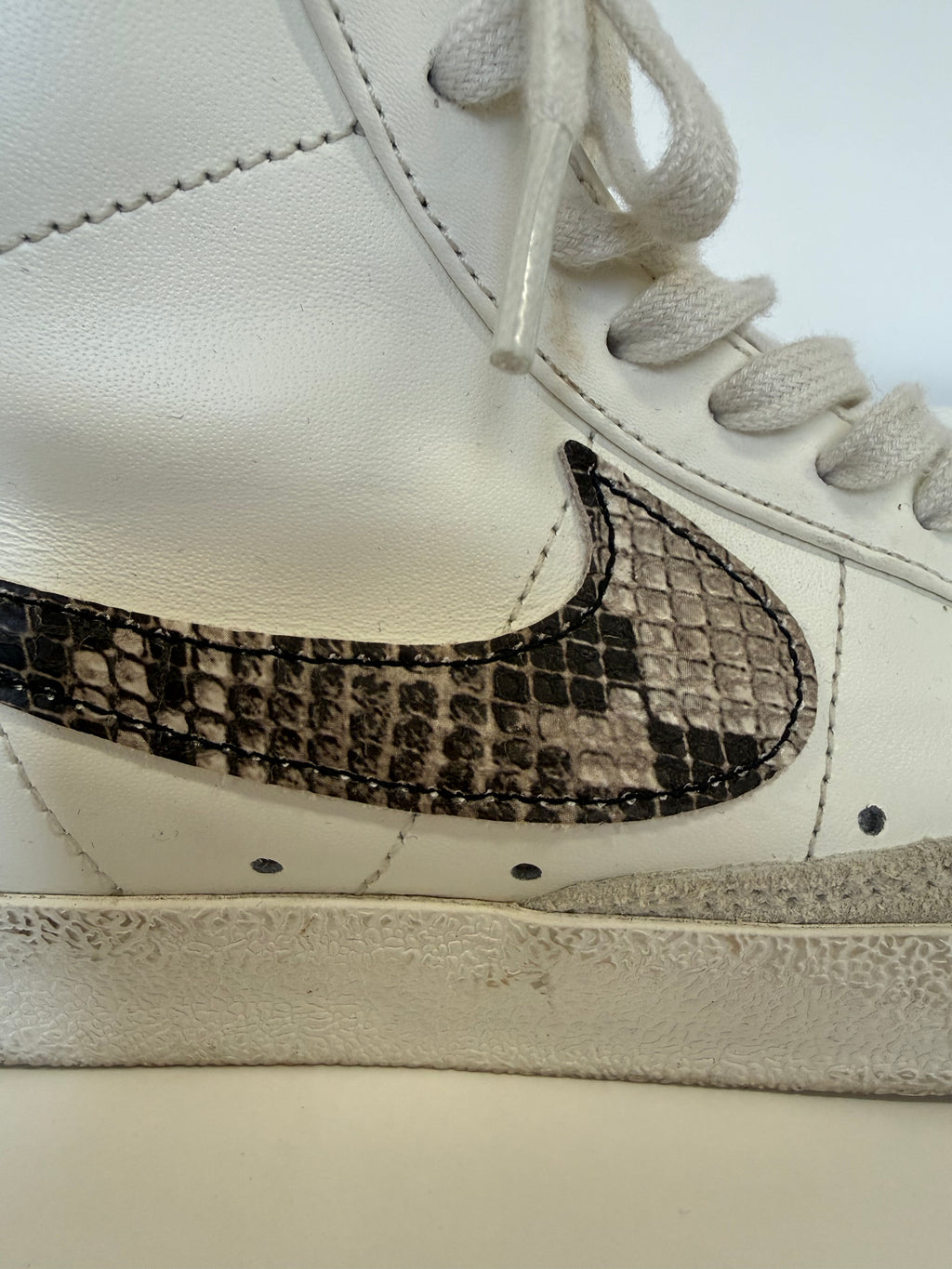 Nike snakeskin tick high tops