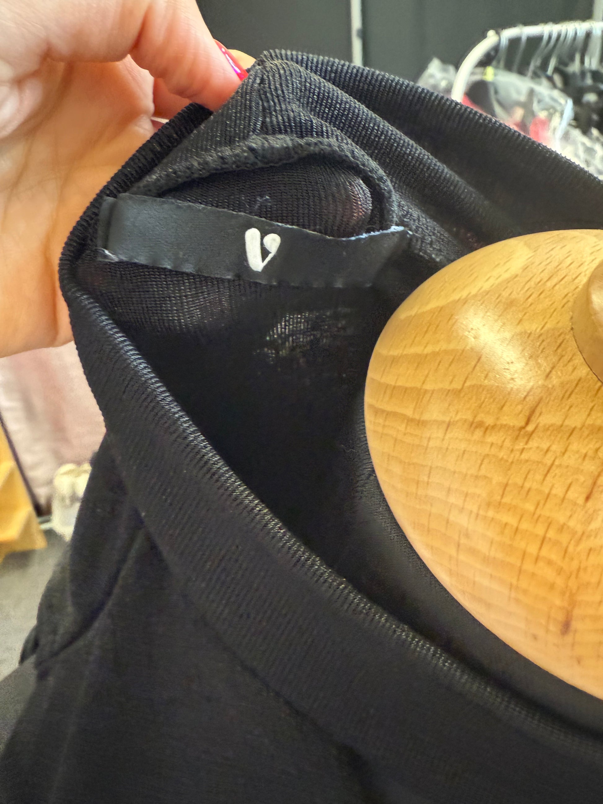 Very black sleeveless high neck top