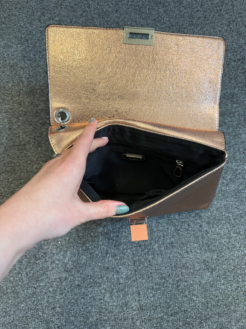 Faith rose gold metallic clutch bag