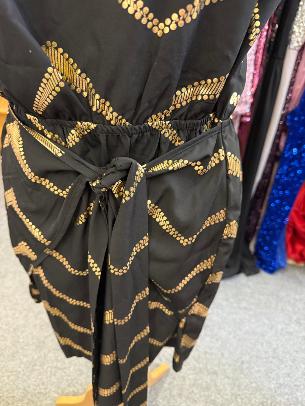 Gold and black one shoulder tie dress