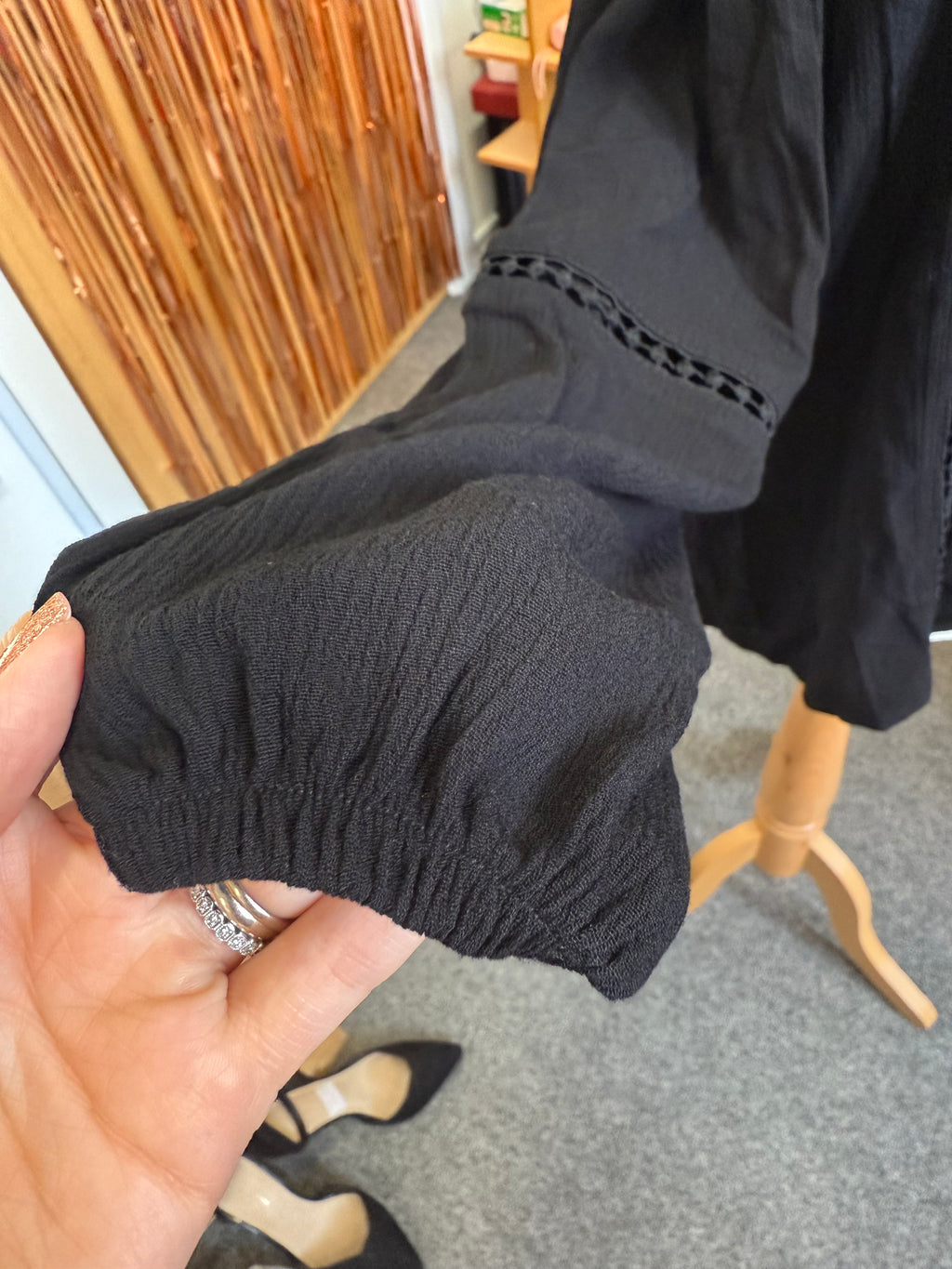 Select black off the shoulder long sleeve top