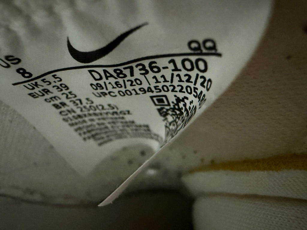 Nike snakeskin tick high tops