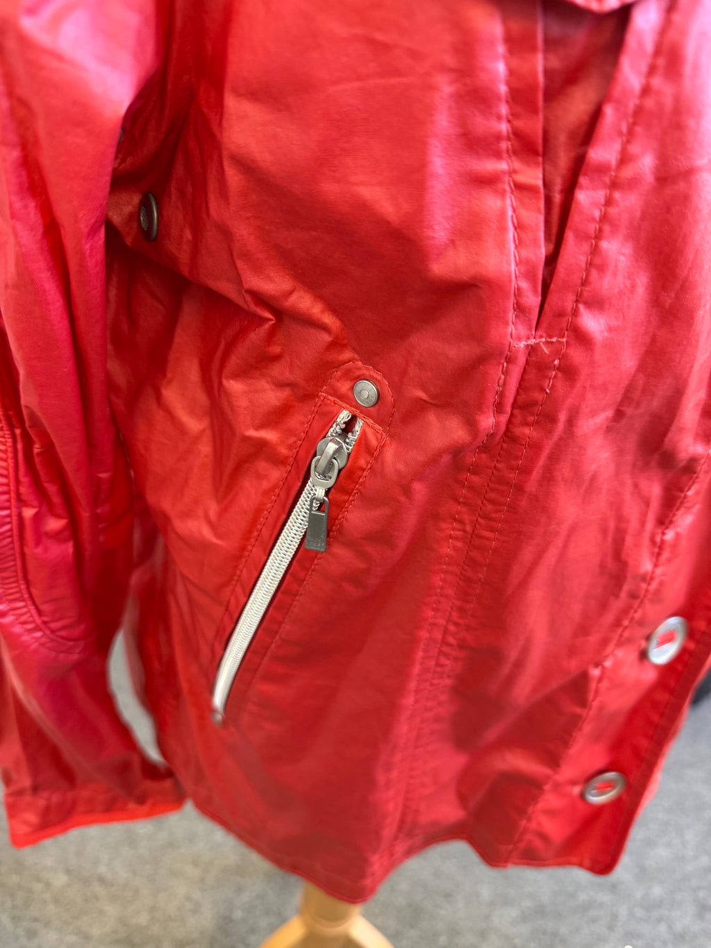 Junge Danmark red raincoat