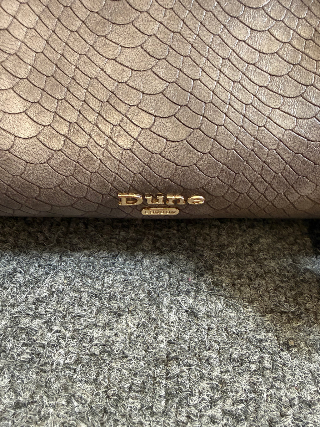 Dune snakeskin handbag