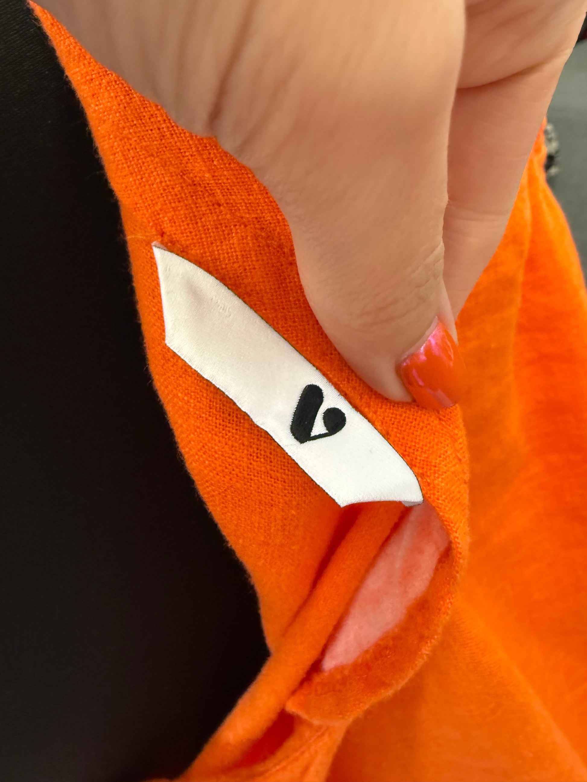 Very orange cold shoulder linen style top