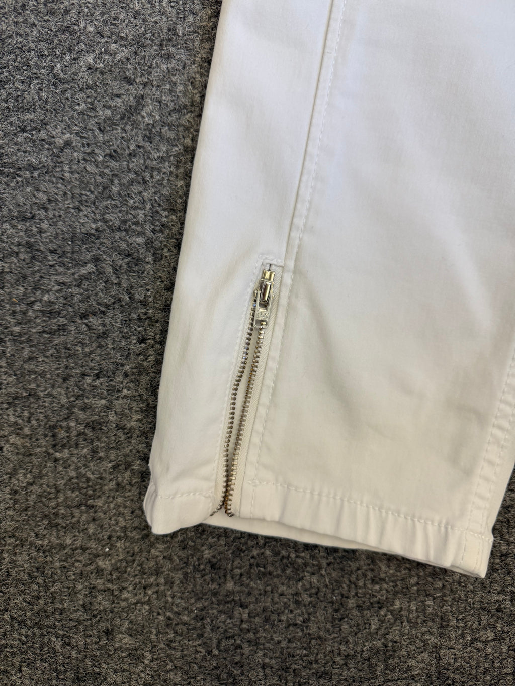 Anna Montana white crop zip bottom trousers