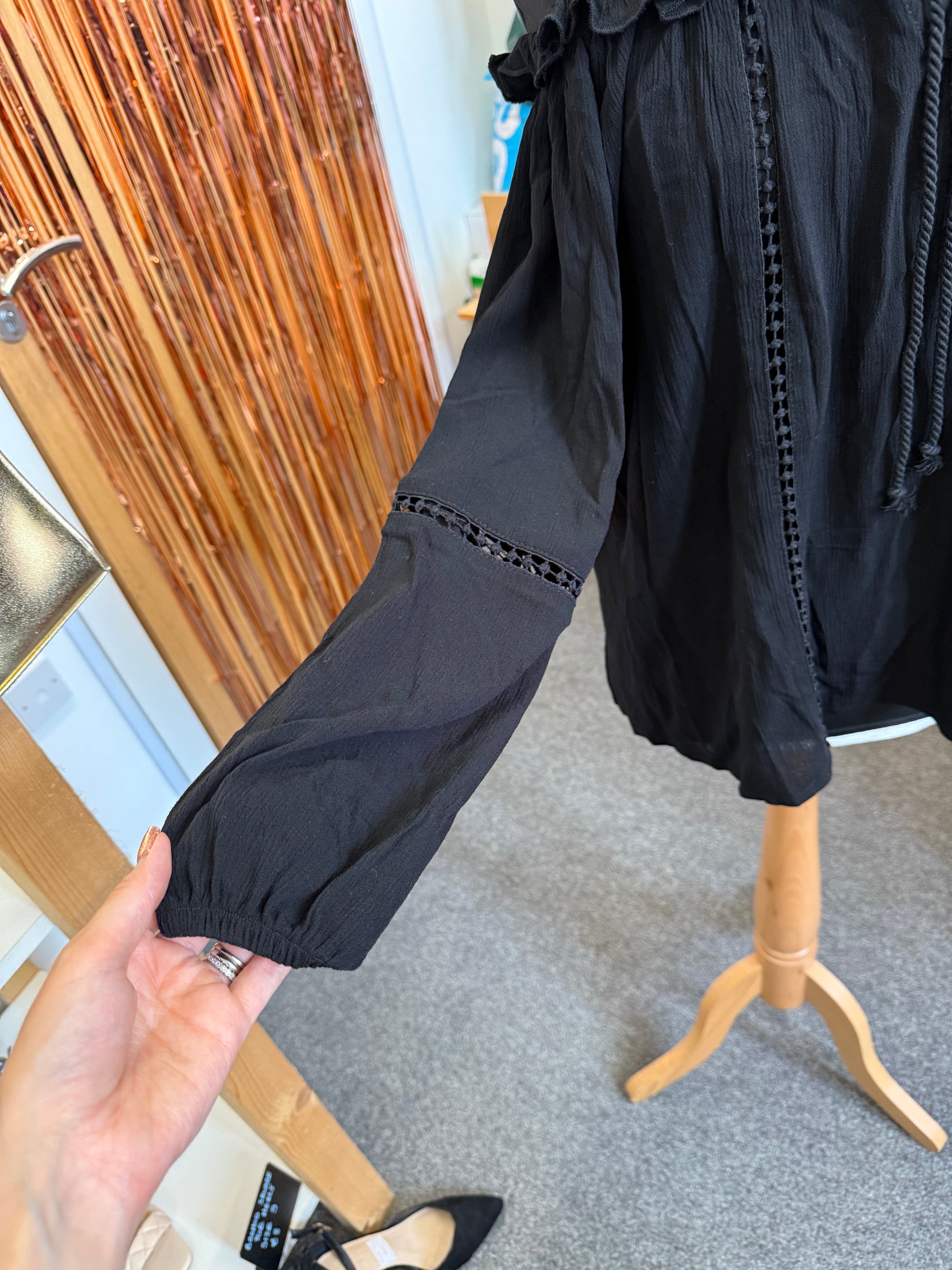 Select black off the shoulder long sleeve top