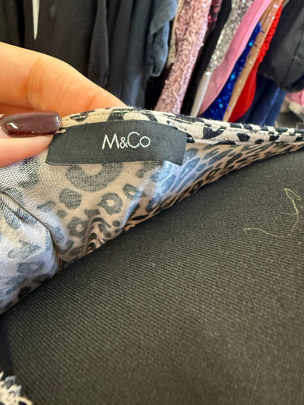 M&Co animal print tie bottom button top
