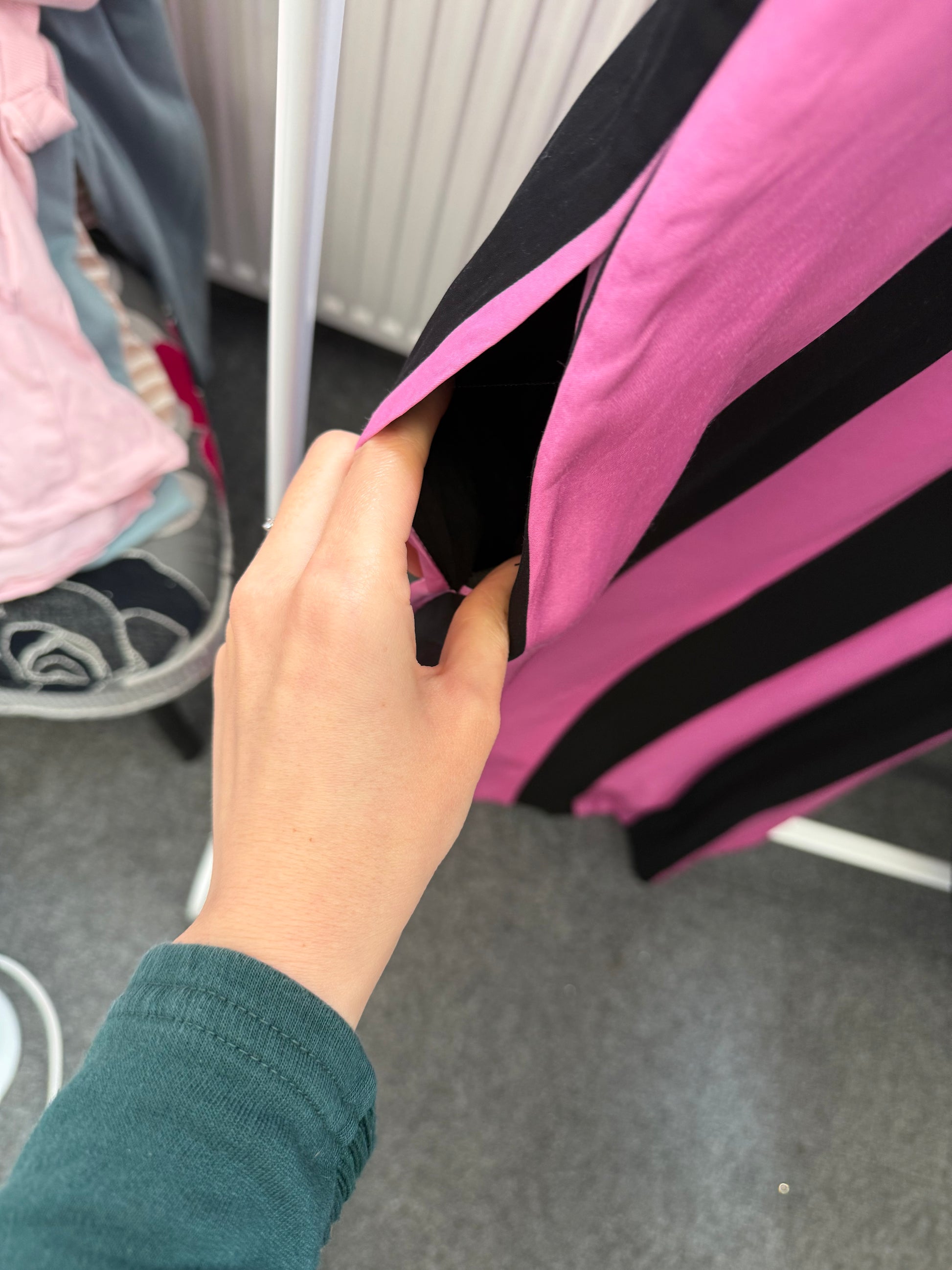 Christopher John Roger’s pink and black stripe midi dress with pockets