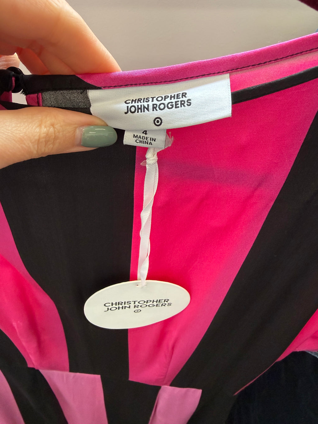 Christopher John Roger’s pink and black stripe midi dress with pockets