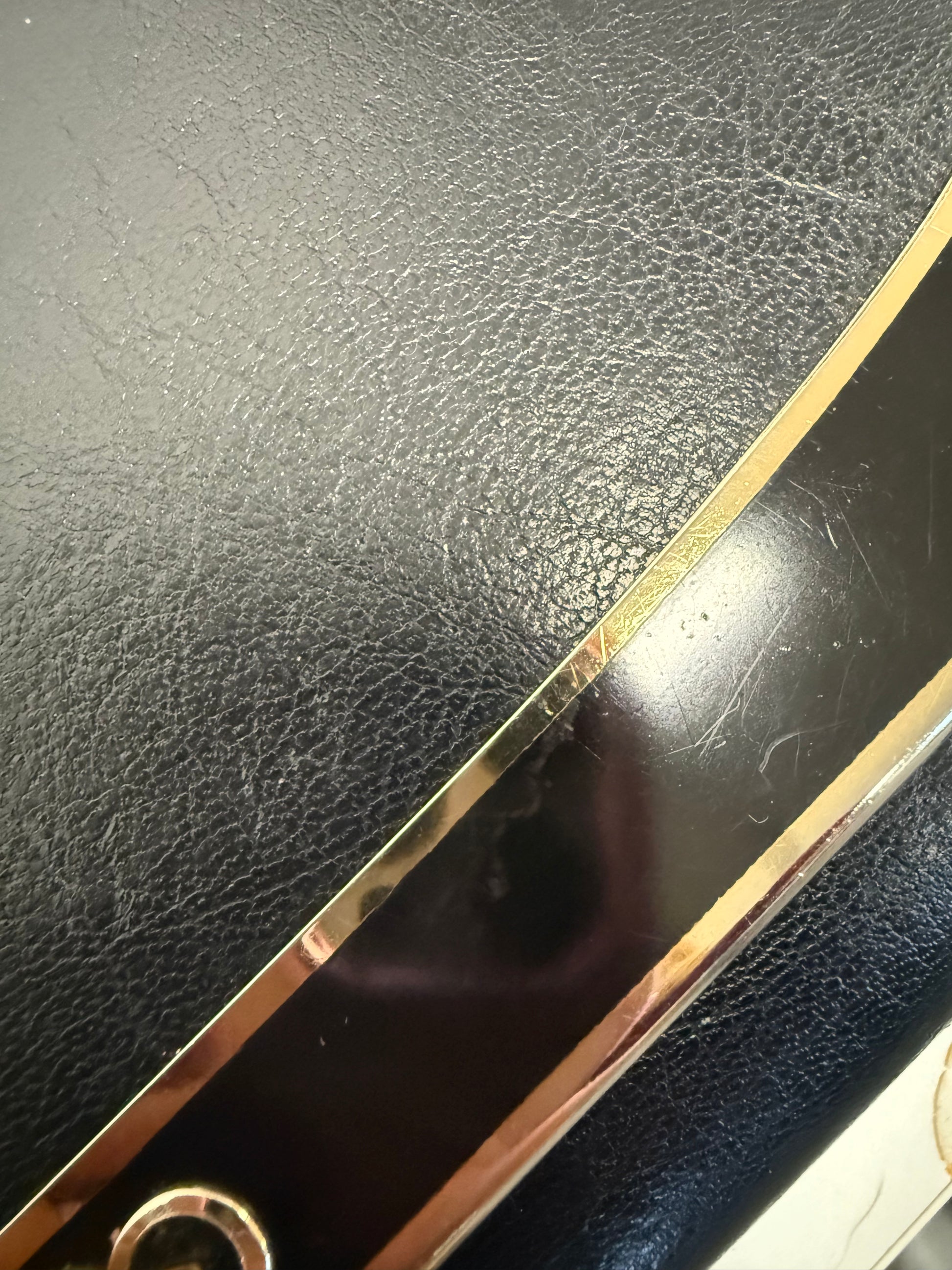 Black and gold chain strap evening bag