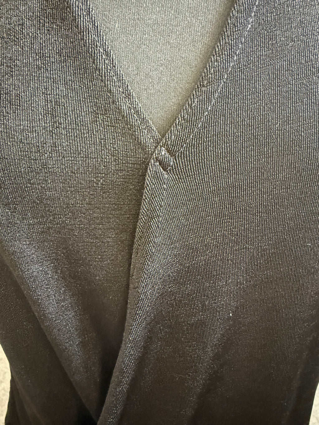 Very black sleeveless high neck top