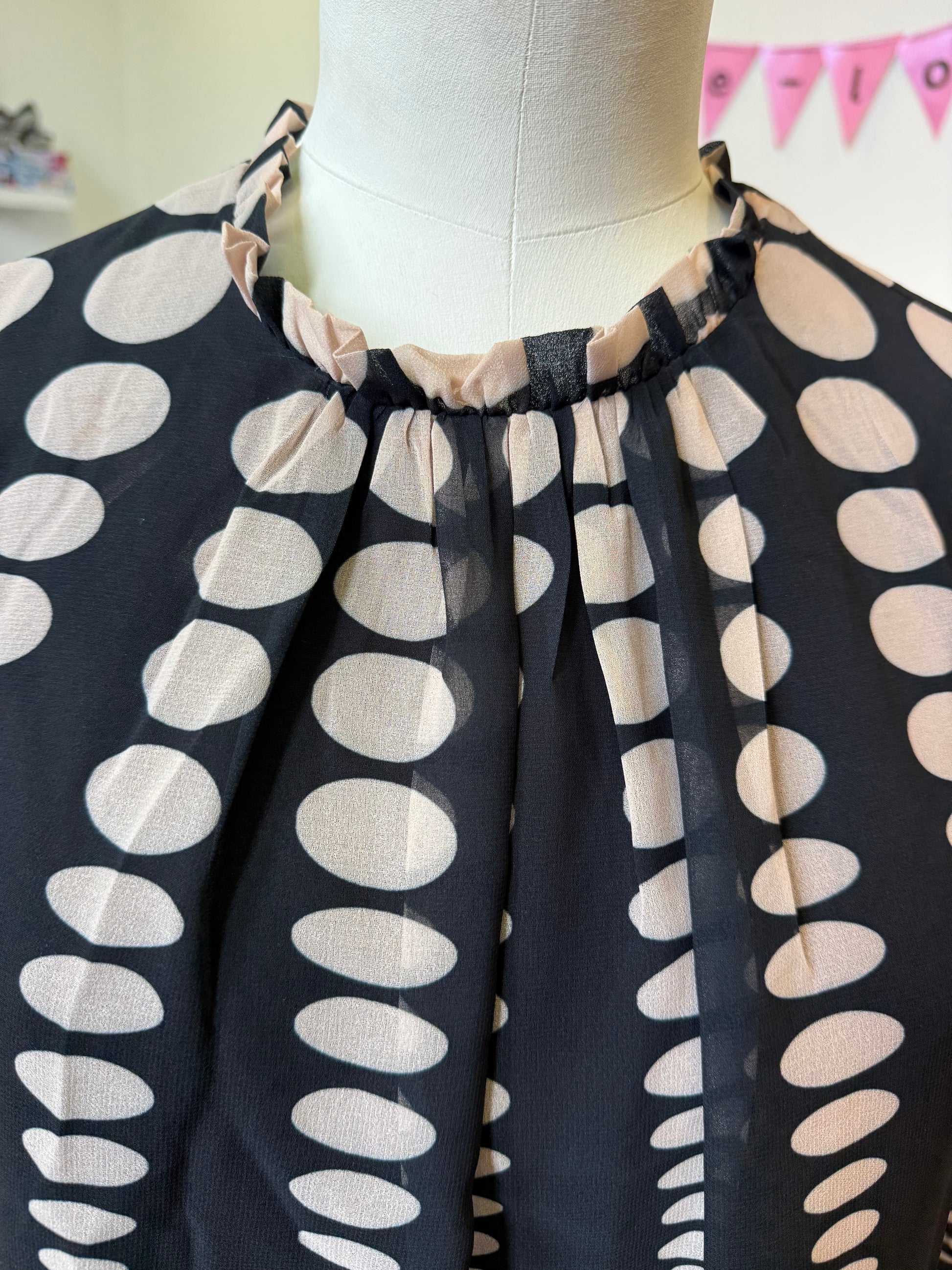 Love & Roses black and beige spot high neck blouse