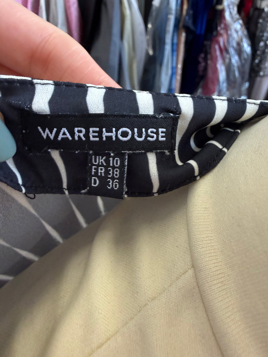 Warehouse print sleeveless zip blouse