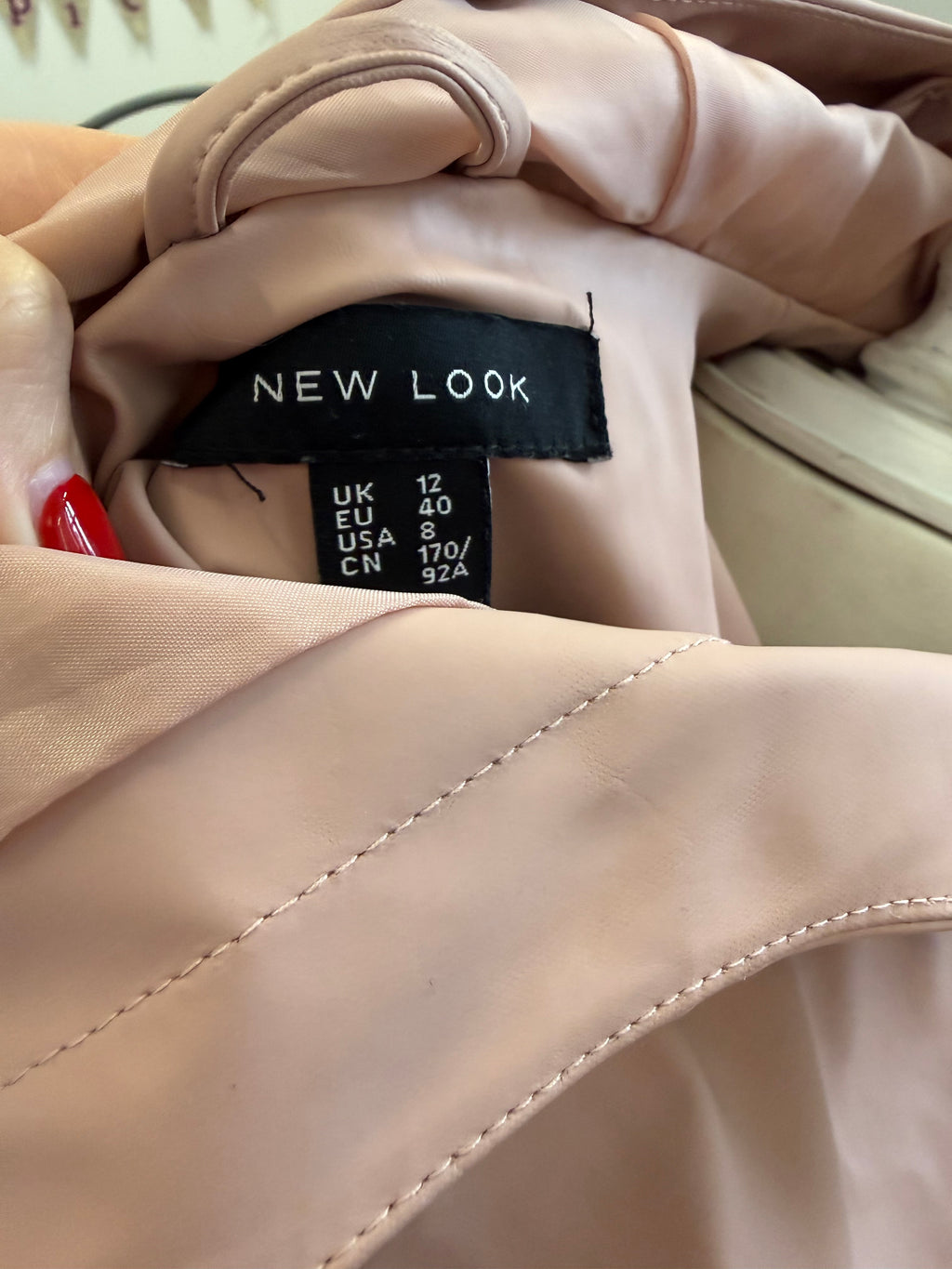 Pink hooded raincoat