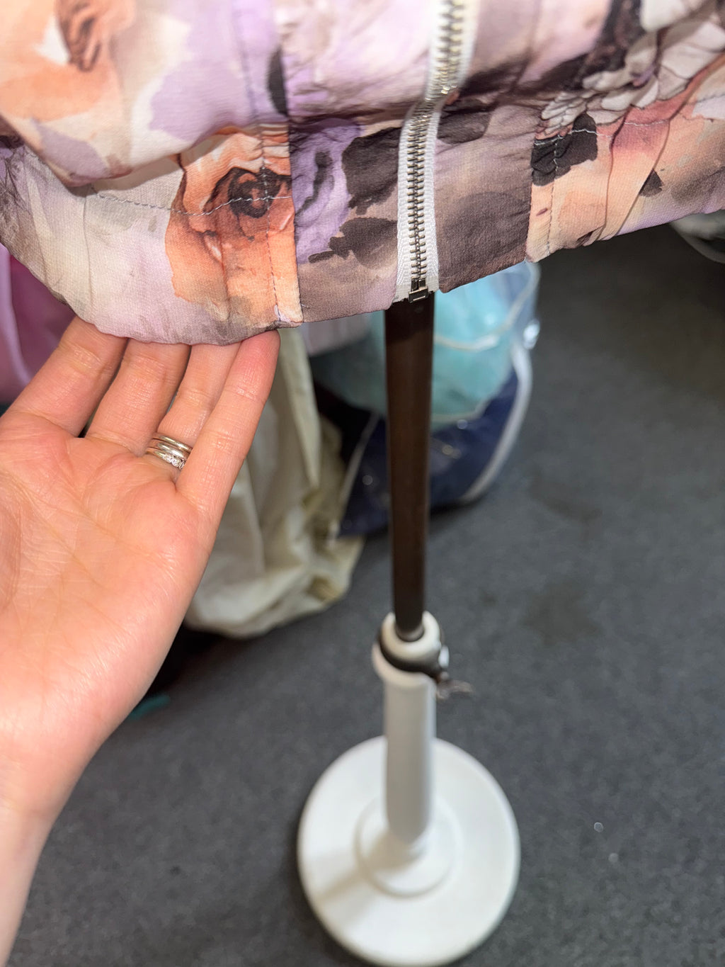 Floral frill neck zip fastening long sleeved top