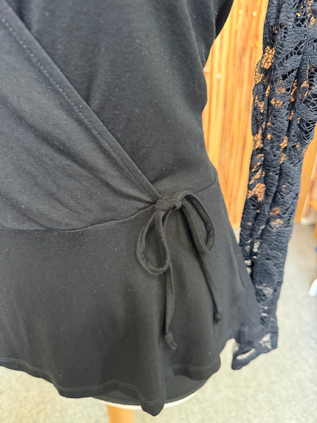 Lipsy black long lace sleeve peplum style wrap top