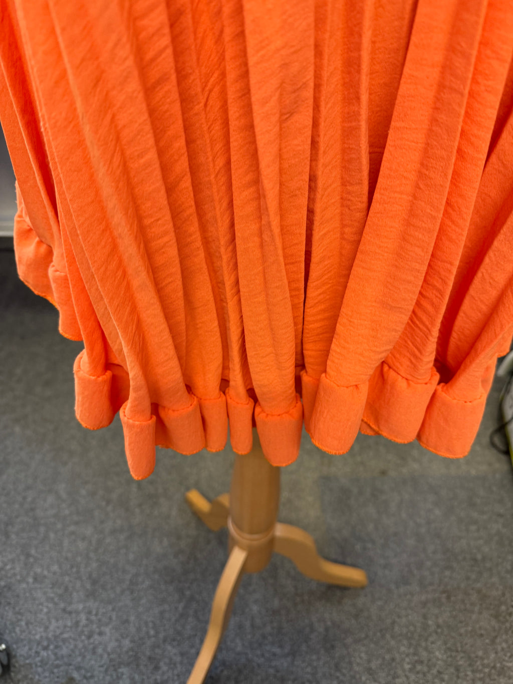 Orange pleat top