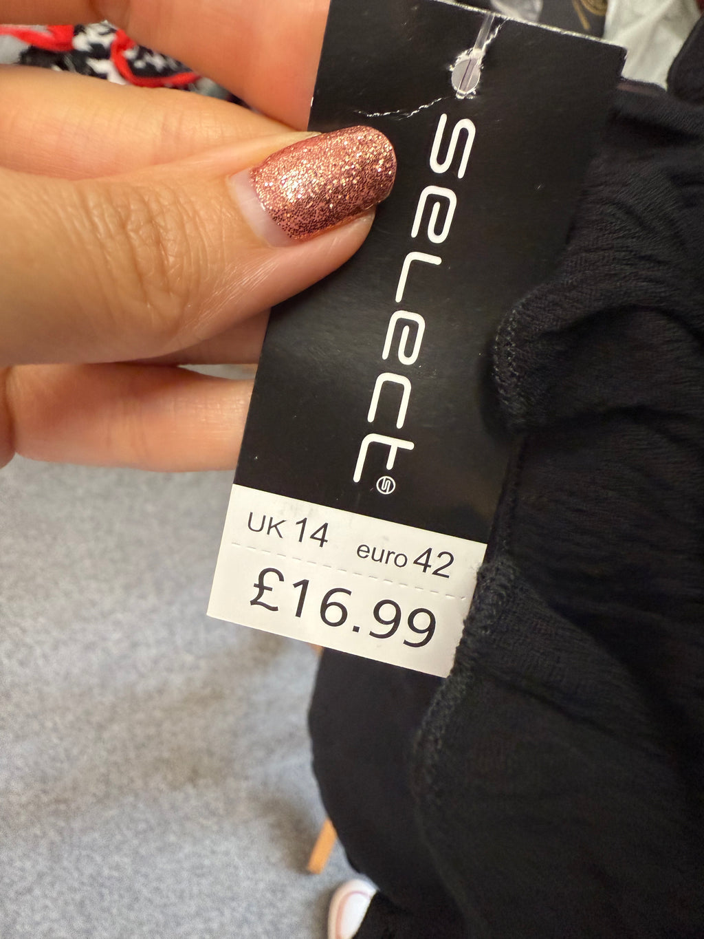 Select black off the shoulder long sleeve top