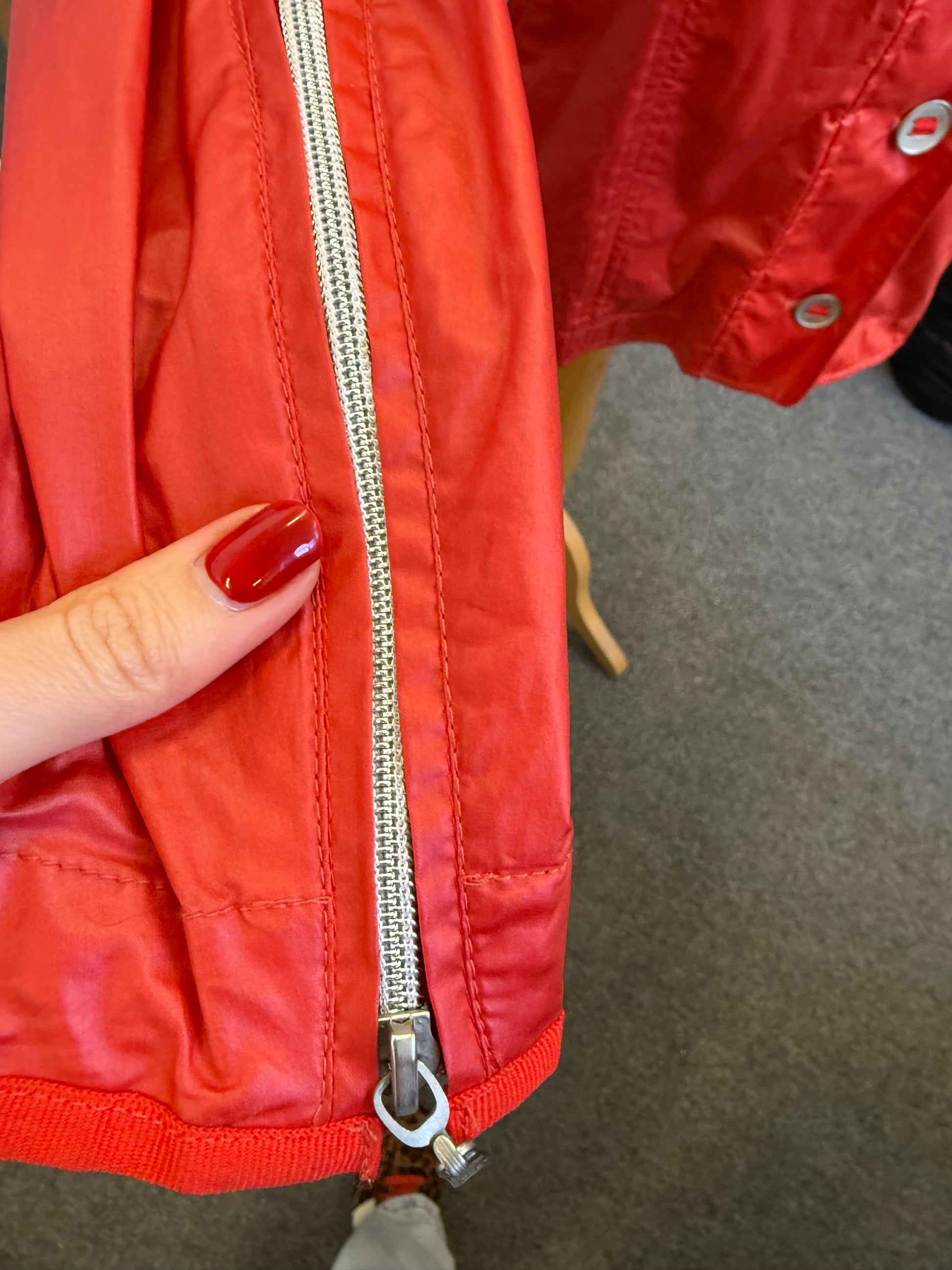 Junge Danmark red raincoat