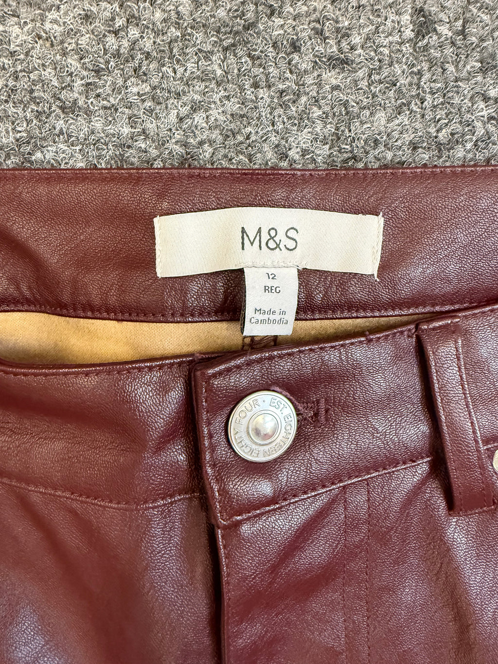 M&S burgundy straight faux leather trousers