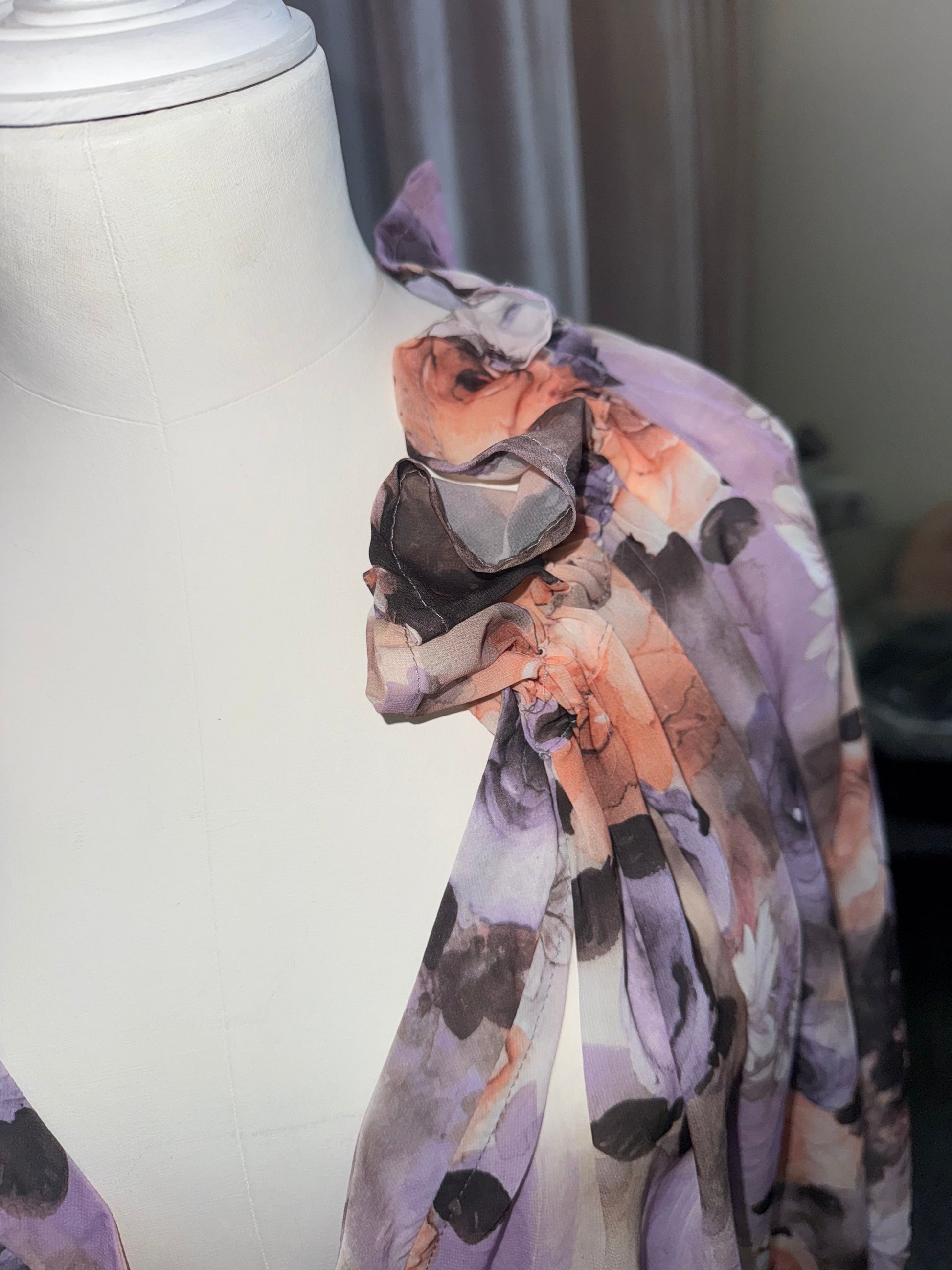 Floral frill neck zip fastening long sleeved top