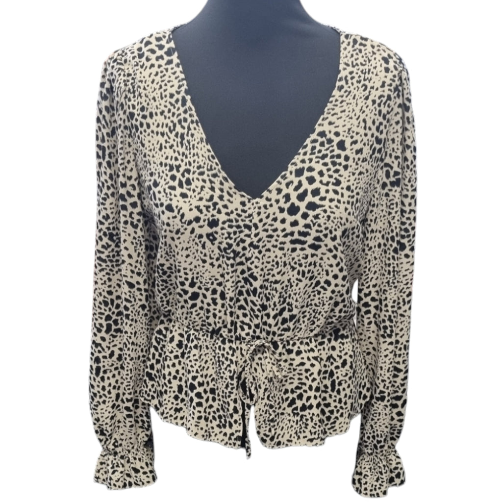 Leopard print peplum long sleeved top