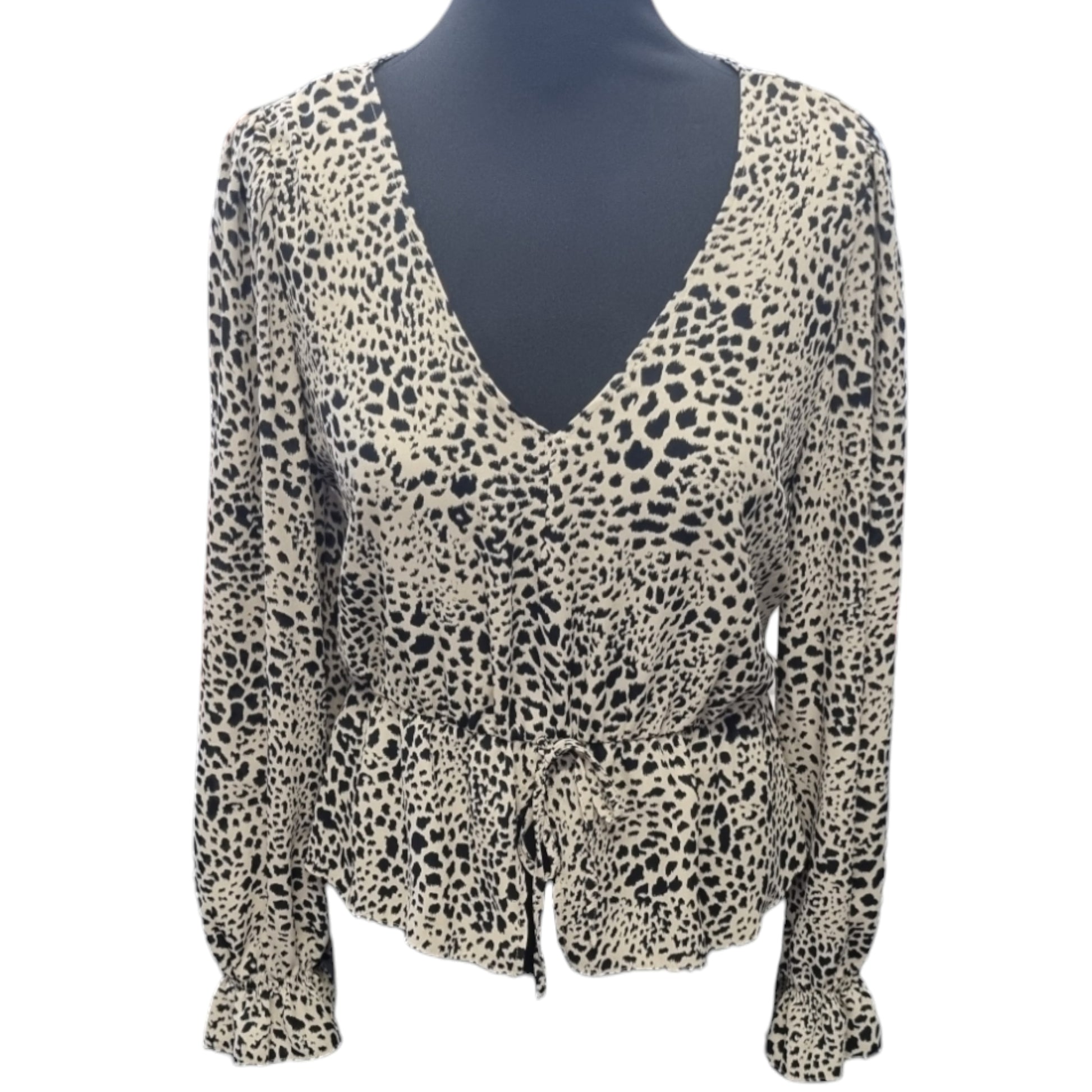 Leopard print peplum long sleeved top