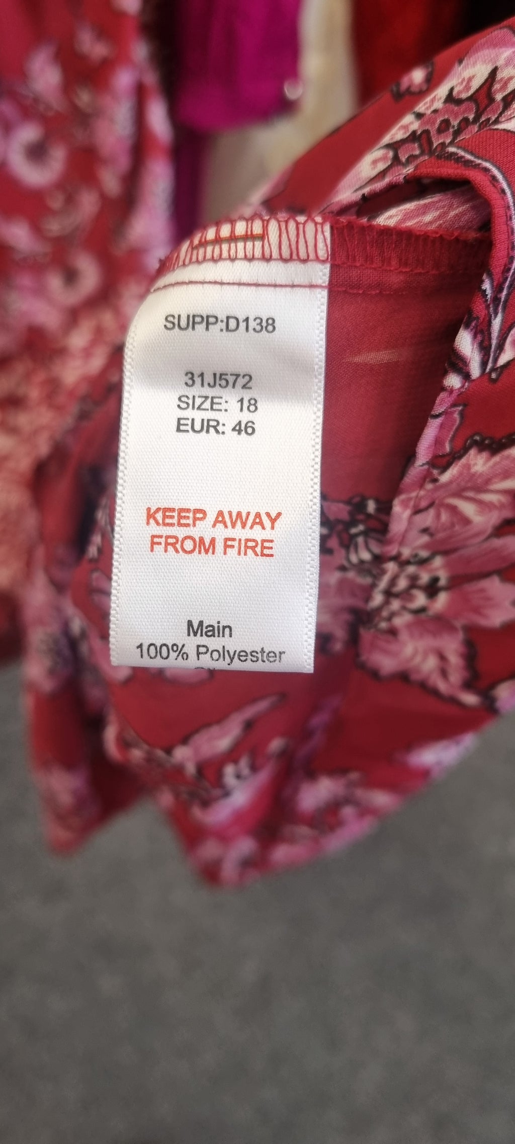 Kaleidoscope floral long sleeved tiered maxi dress