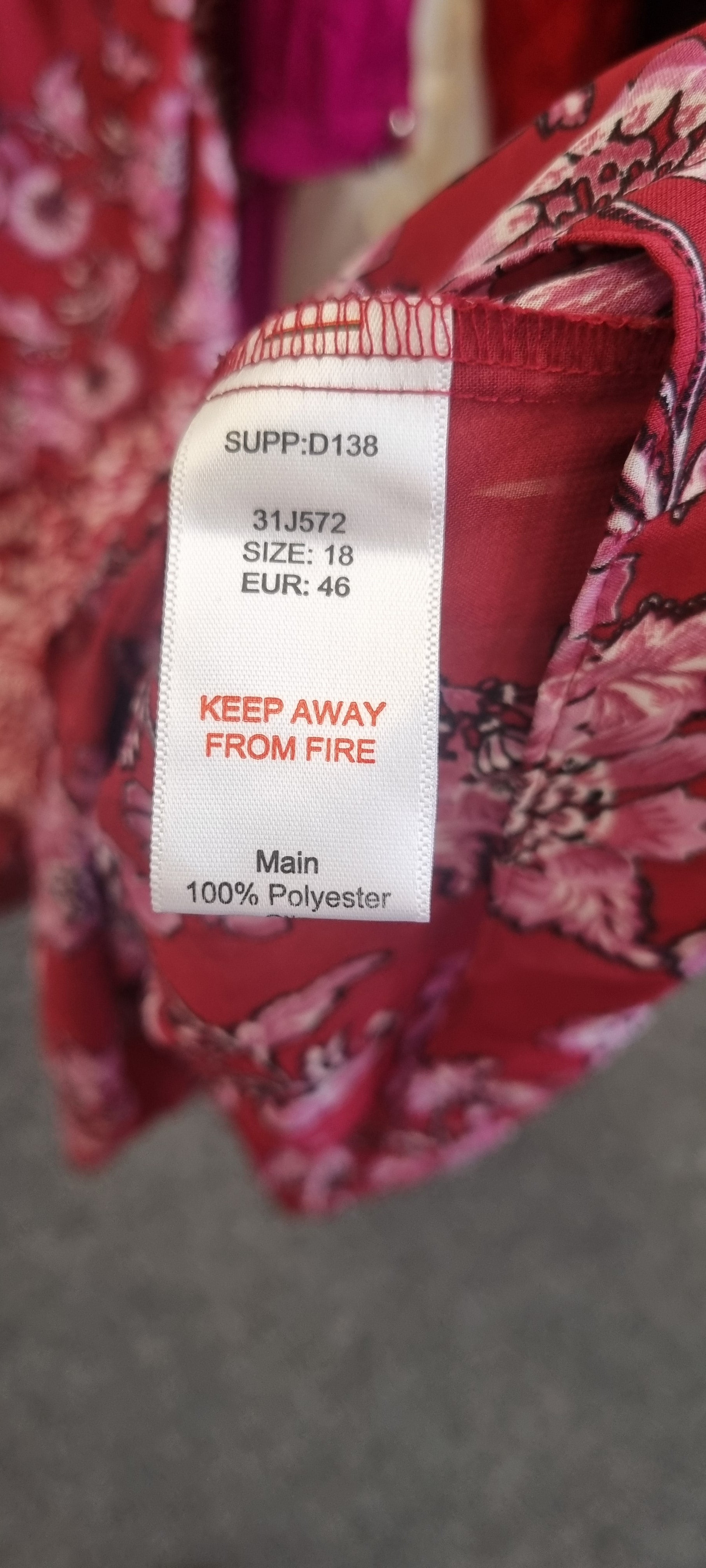 Kaleidoscope floral long sleeved tiered maxi dress